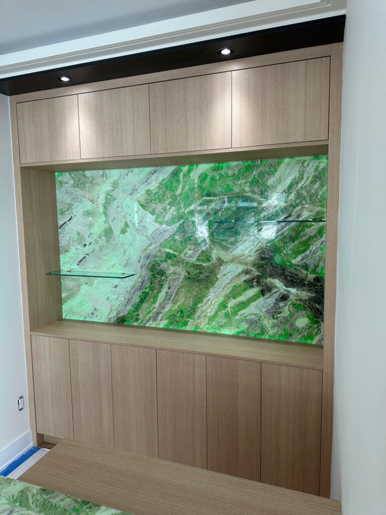 backlit-lit-glowing-green-wall-shelves-feature-kitchener-stone