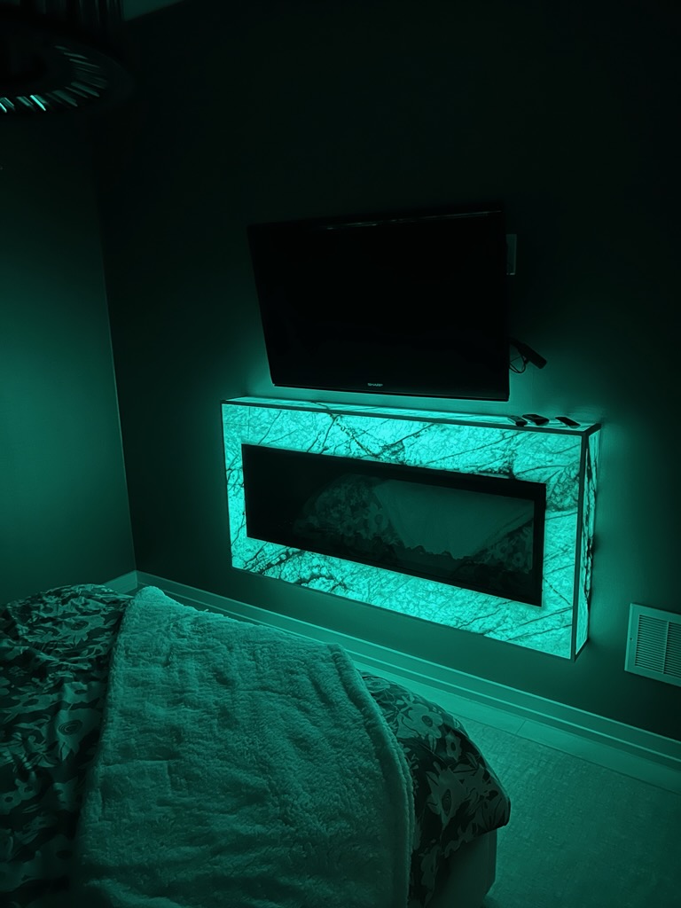 backlit-darkroom-green-onyx-console-fireplace
